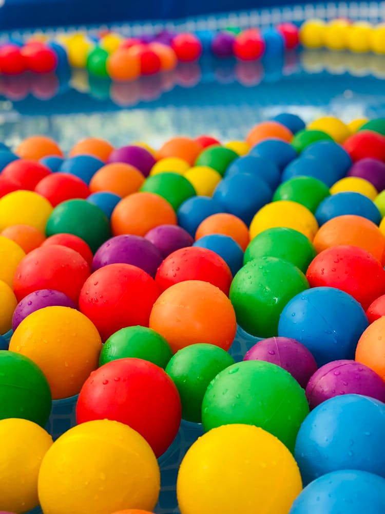 Colorful Plastic Balls In The Pool