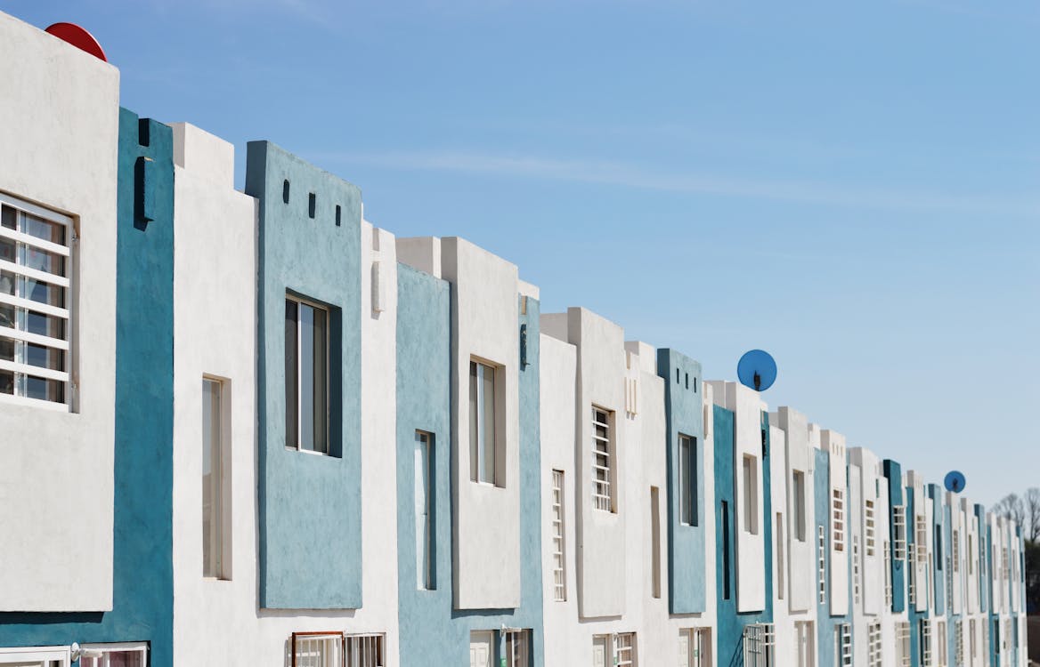 A Row of White and Blue Condominiums Funded by a Hard Money Lender