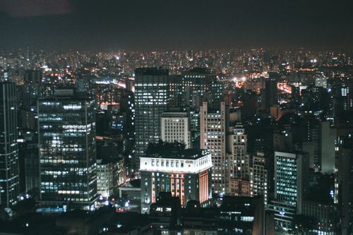 Free Captivating view of São Paulo cityscape illuminated at night, showcasing skyscrapers and bustling urban life. Stock Photo