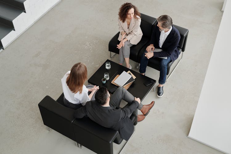 High Angle Shot Of A People Having A Business Meeting 