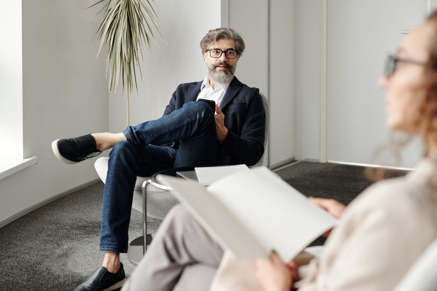 Business adviser meeting with a client in a modern office