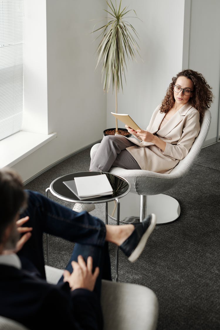 Woman Interviewing A Man