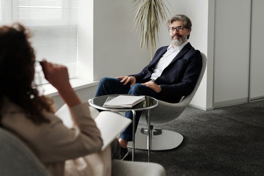Professional meeting in a modern office setting, showcasing business collaboration and communication.