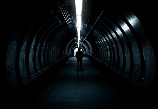 Silhouette of Man Standing Against Black And Red Background · Free ...