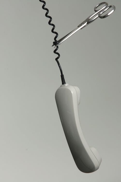 Scissor Cutting Telephone's Trim Line