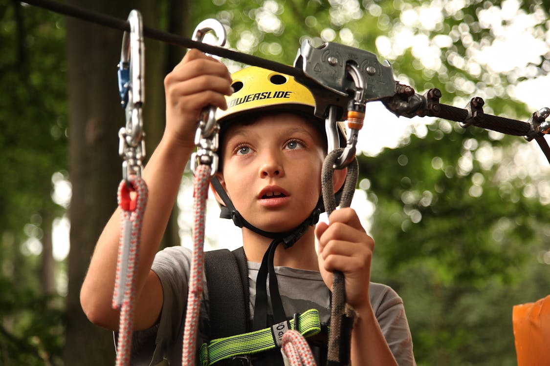 Free Boy Holding Silver Harness Stock Photo