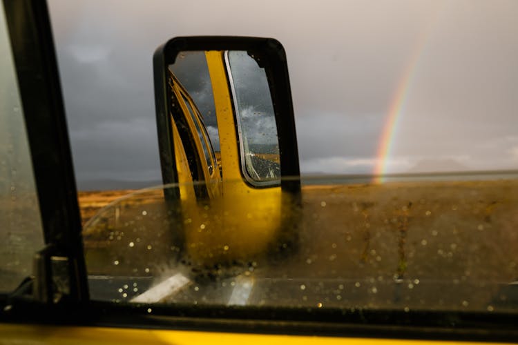 View From Inside Car Of Rainbow On Rainy Day