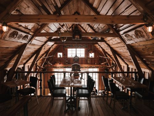 Free Spacious wooden interior of modern cafe decorated in style of old marine vessel Stock Photo