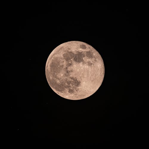 Free Full spotted moon in black sky at night Stock Photo