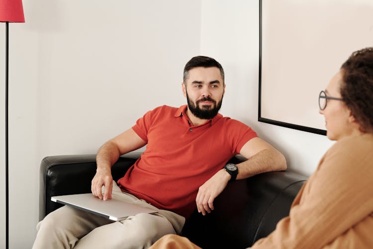 Man And Woman Talking In Office