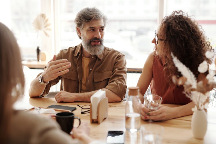 A Man And Woman Talking Together 