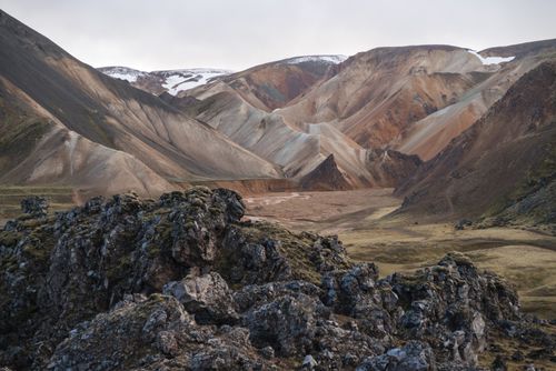 Free Amazing colorful volcanic mountains with snowy peaks and rocky formations in Fjallabak Nature Reserve in Iceland Stock Photo