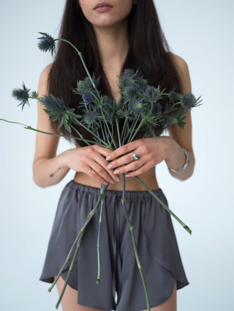 Crop Fit Woman With Sea Holly Flowers