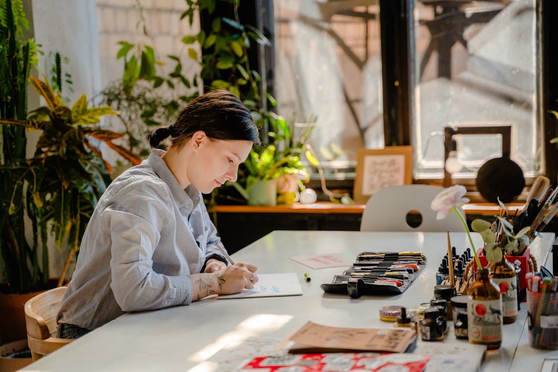 Free Photo of Woman Doing Lettering Stock Photo