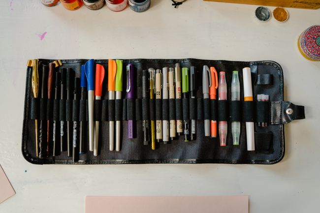 Colorful pens arranged on a creative desk