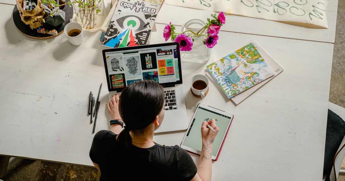 Professional reviewing documents and planning next career steps after a job transition