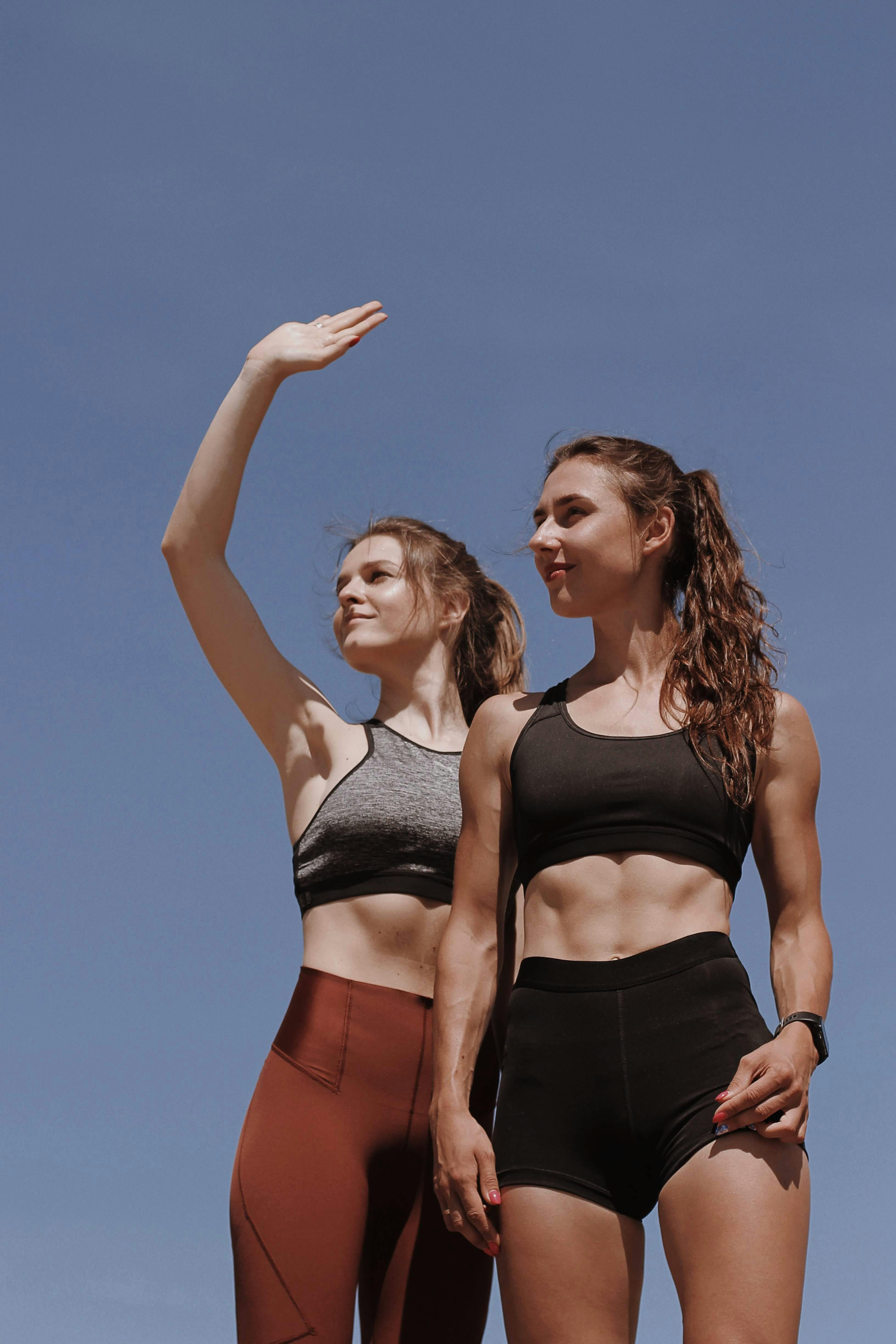 women standing together wearing fitness wear