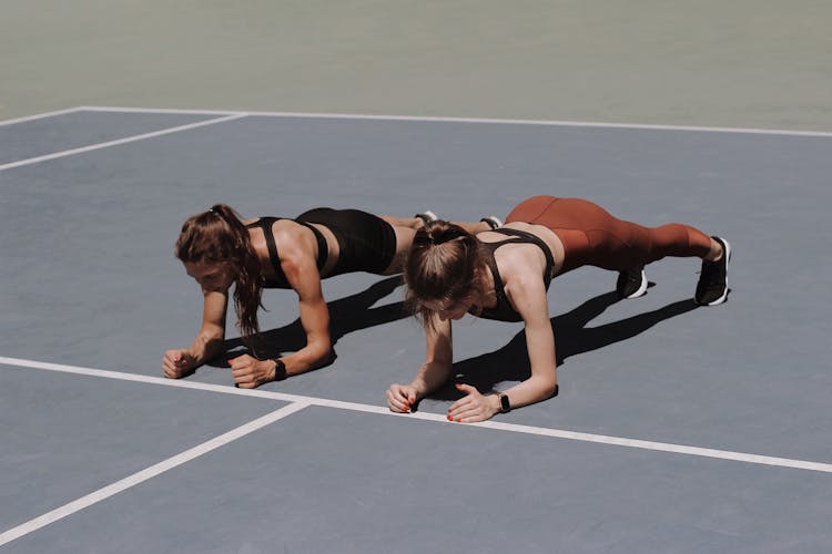 Two Women Doing Workout Together