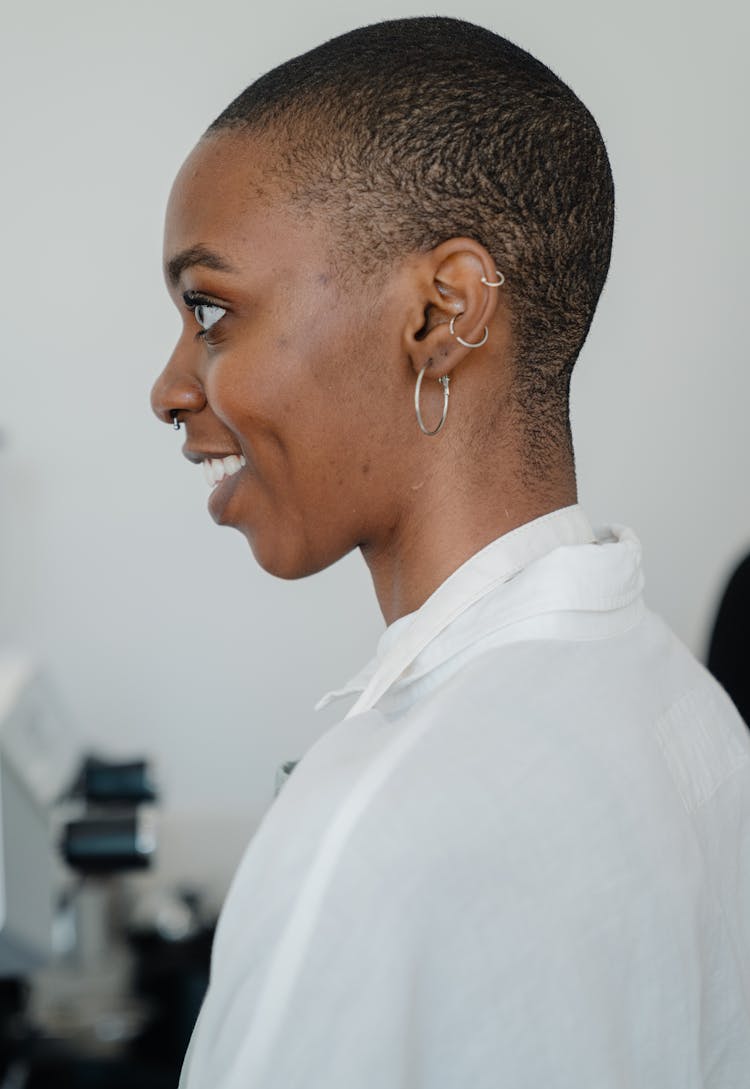 Cheerful Young Black Woman During Work In Coffee House