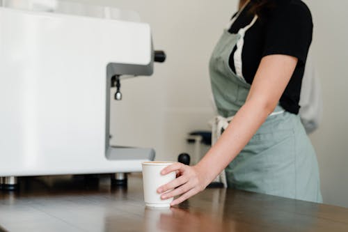 Free Person Holding Cup of Coffee Stock Photo