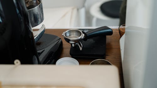 Portafilter and coffee machine in kitchen
