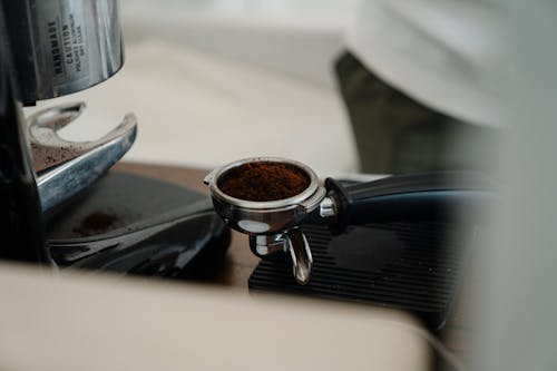 Professional barista coffee making tools on wooden table