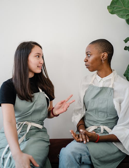 Free Photo of Two Women Talking to Each Other Stock Photo
