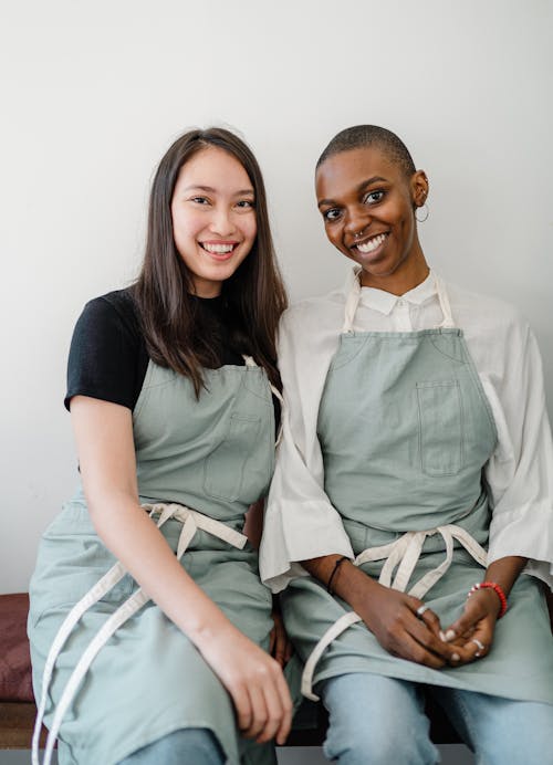 Photo of Two Women Smiling