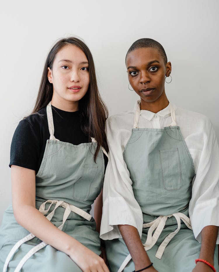 Photo Two Women Looking Serious