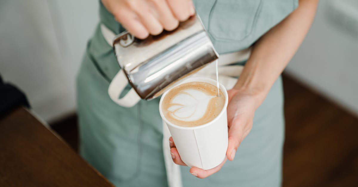Barista Preparing Latte Art In A Coffee Shop