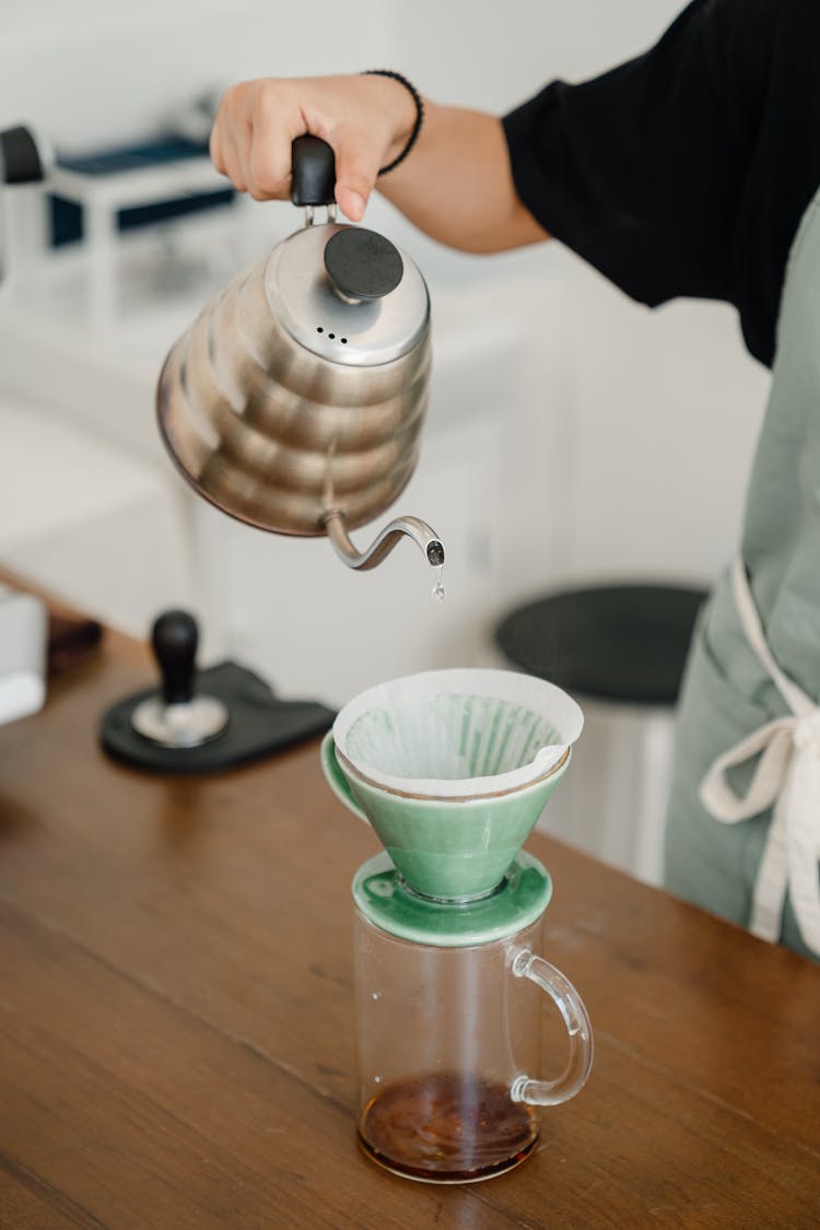 Crop Barista Brewing Coffee With Pourover Filter