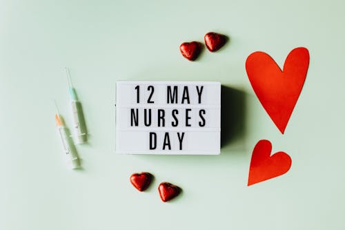 Nurses Day Sign with Hearts and Syringes