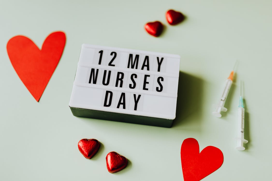 Nurses Day Sign with Hearts and Syringes