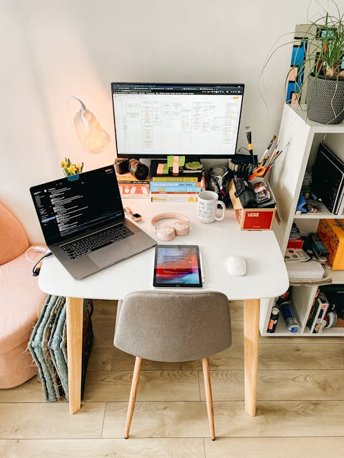 White Table with Laptop and Tablet Computer