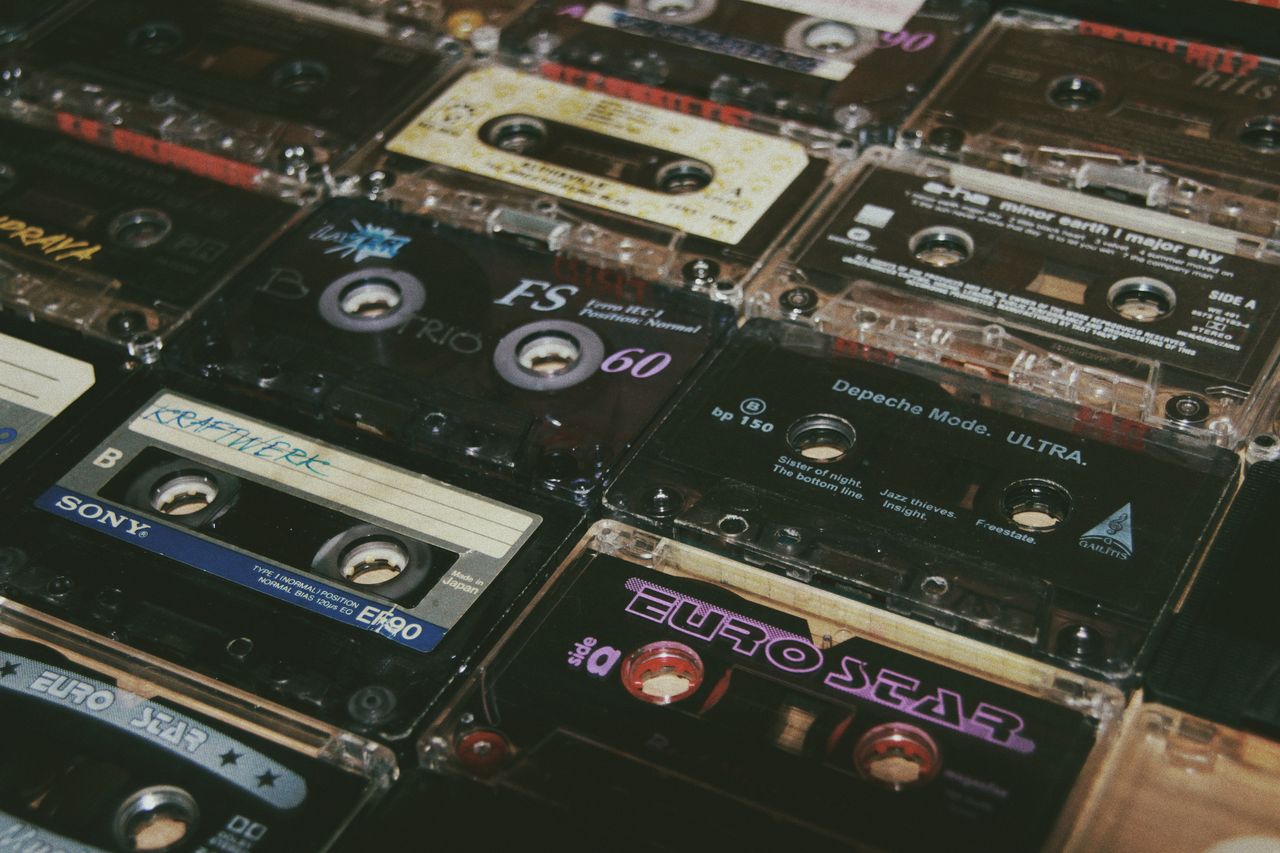 from above of various vintage audio cassettes with colorful inscriptio