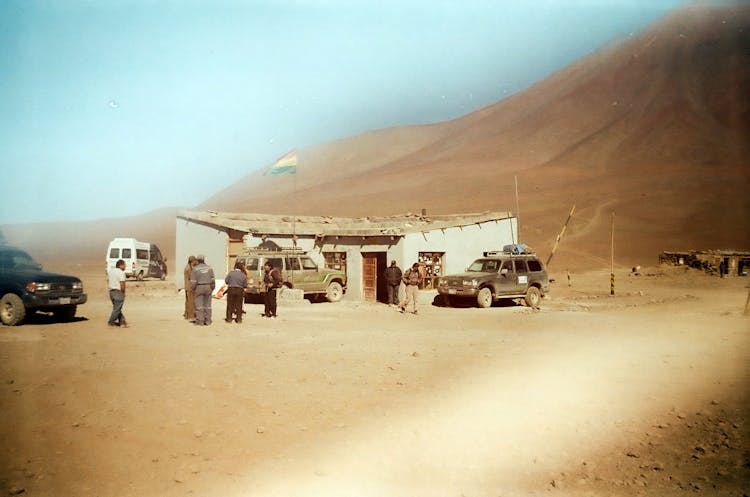 People Near Building With Bolivian Flag