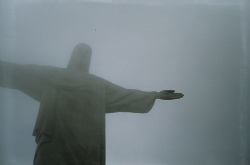 Free A foggy view of the iconic Christ the Redeemer statue in Rio de Janeiro, Brazil. Stock Photo