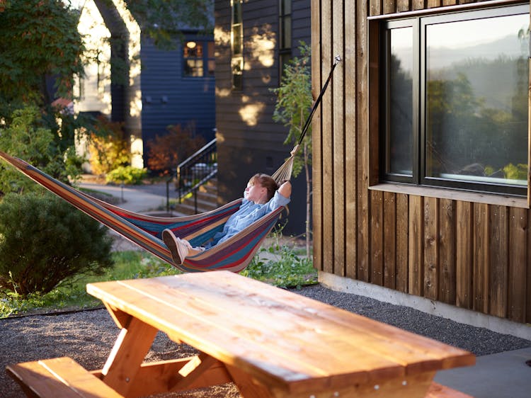 Relaxed Woman Having Nap In Hammock