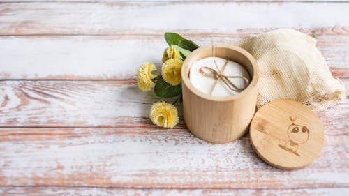 Free White Cotton Pads in a Bamboo Container Stock Photo