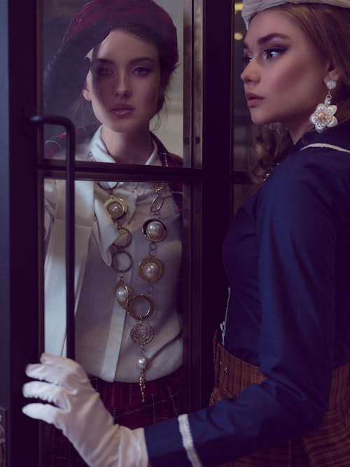 Women Posing in Vintage Clothing