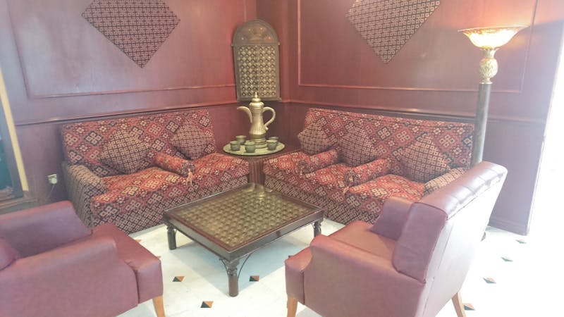 Athlete in a serene yoga pose during sunset, embodying mindful strength training