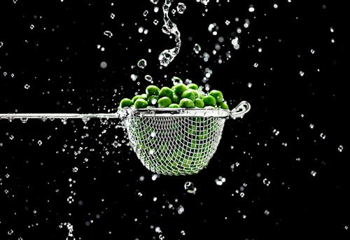 Green Fruits in Strainer