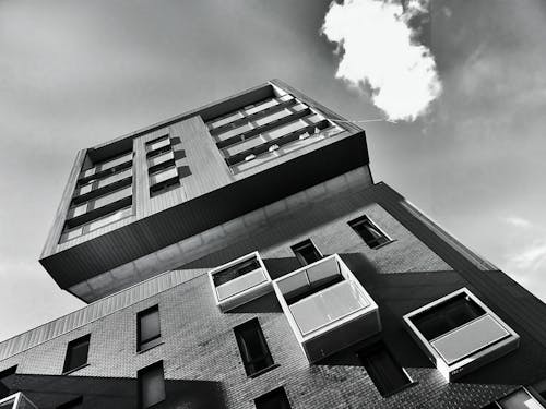 Low-angle Photo of Gray Mid-high Concrete Building