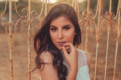 Woman in White Floral Lace Dress