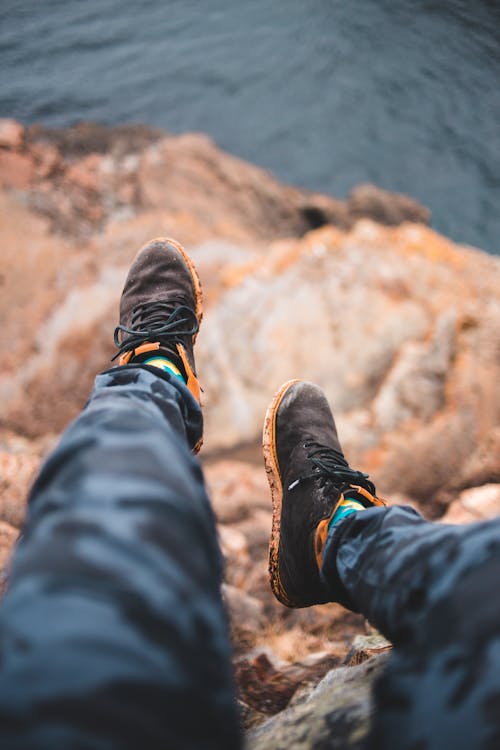 Free Photo of Person Wearing Hiking Shoes Stock Photo