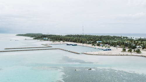 Free Island port in calm ocean Stock Photo