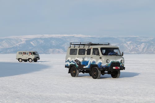 Two Vans on Frozen Baikal Lake 