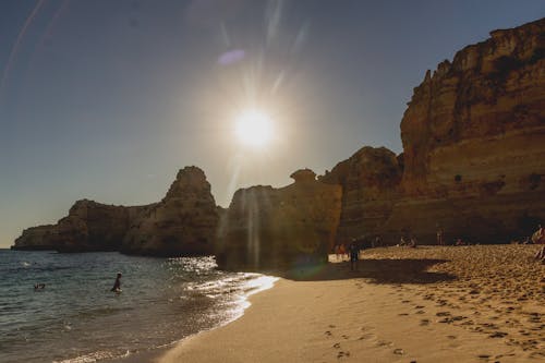 คลังภาพถ่ายฟรี ของ montain, ชายหาด, ดวงอาทิตย์