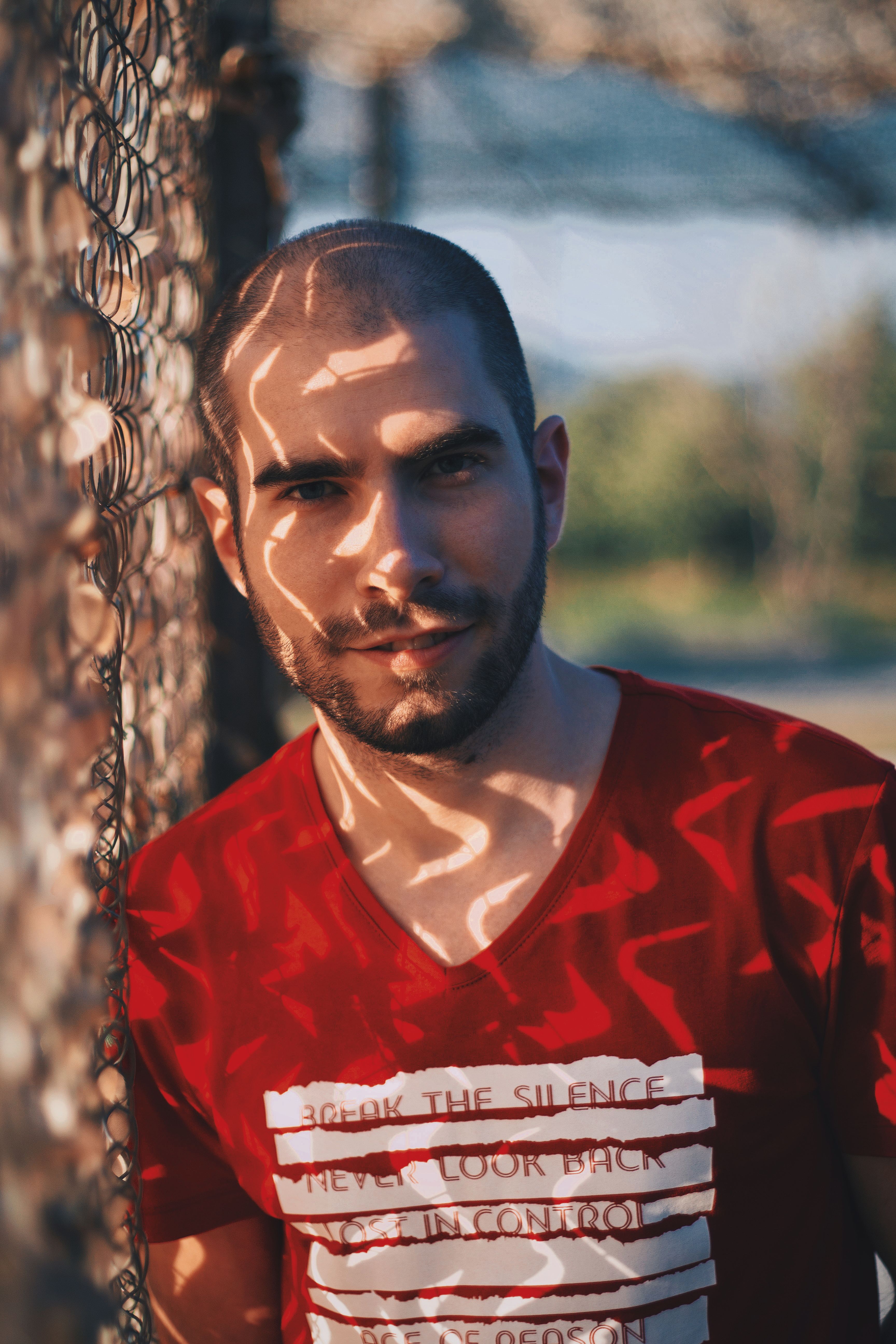 Man in Red V-Neck Shirt · Free Stock Photo