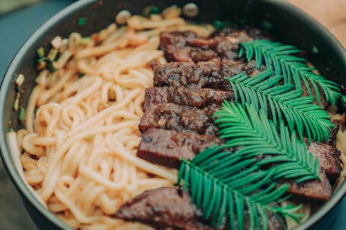 Photo of Noodles With Meat and Garnish